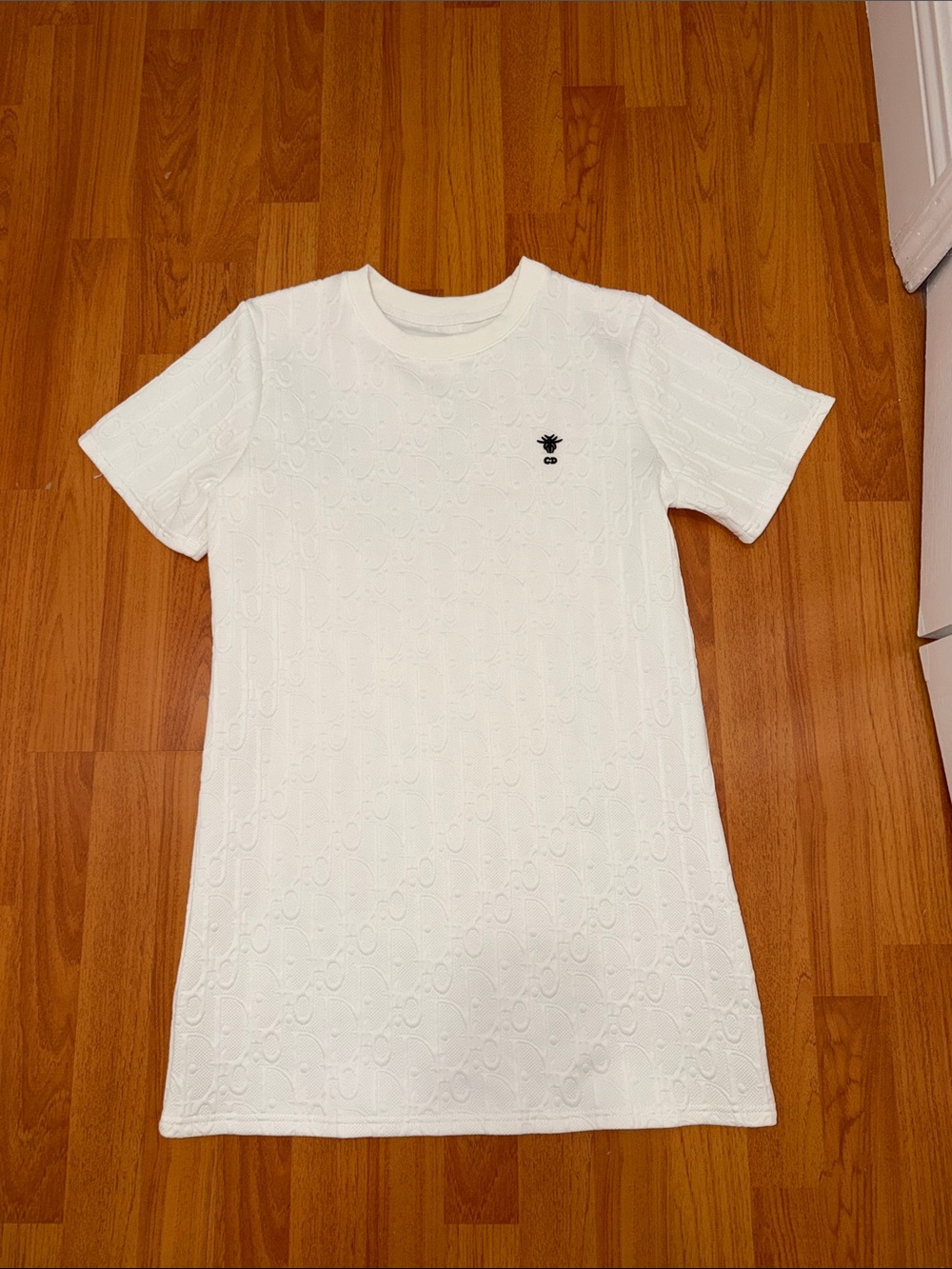 White Embossed Tee with Black Bee Logo